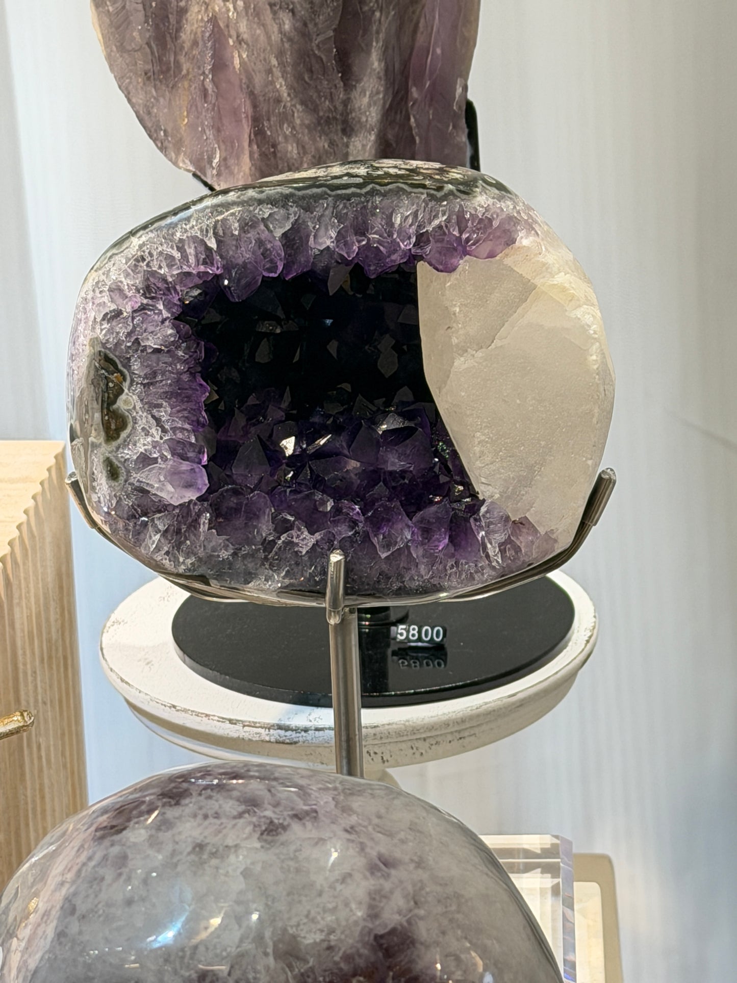 Brazilian amethyst geode with calcite