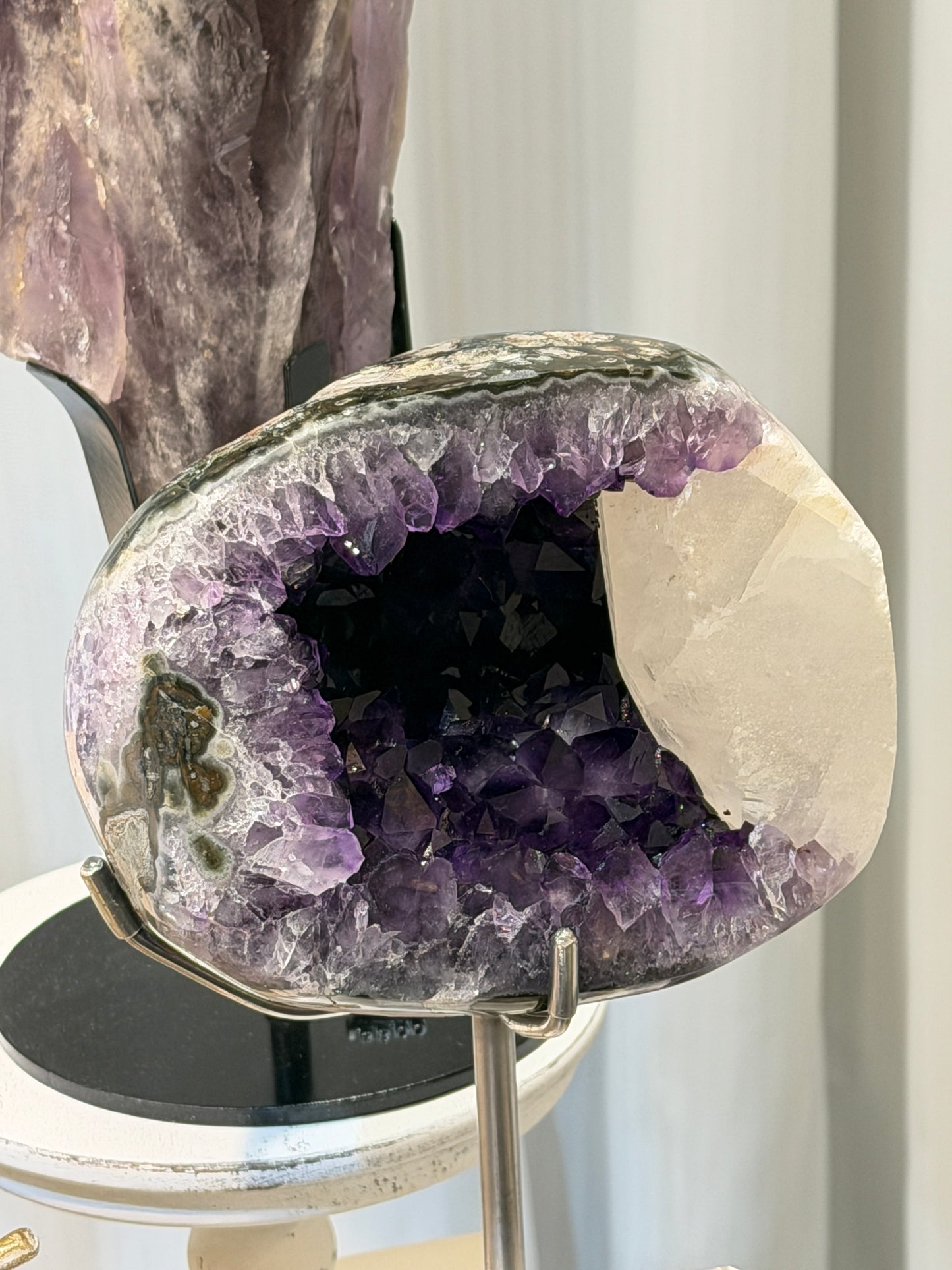 Brazilian amethyst geode with calcite