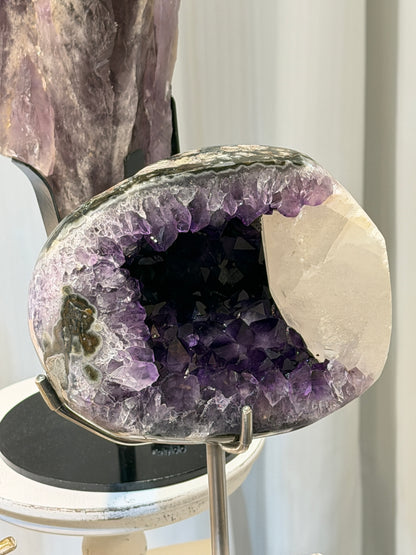 Brazilian amethyst geode with calcite